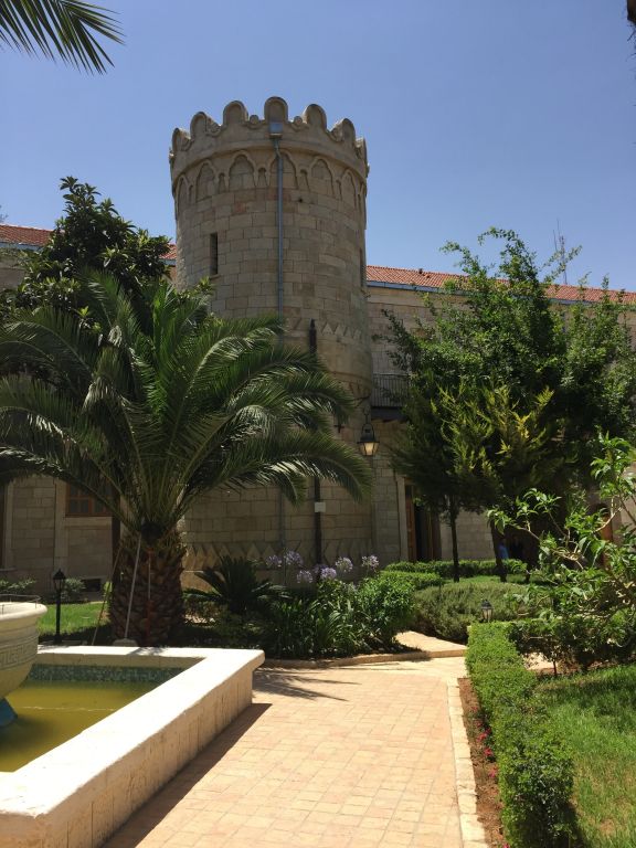 One of the two Renaissance-styled towers and fishponds in Sergei’s Courtyard, now housing the public bathrooms (Jessica Steinberg/Times of Israel)